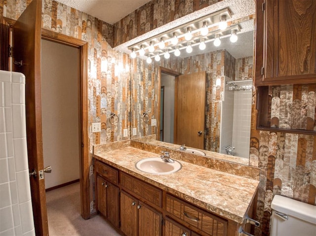 1520 NE 2nd St, Moore, OK 73160 - full bath featuring toilet, a textured ceiling, baseboards, walk in shower, and vanity