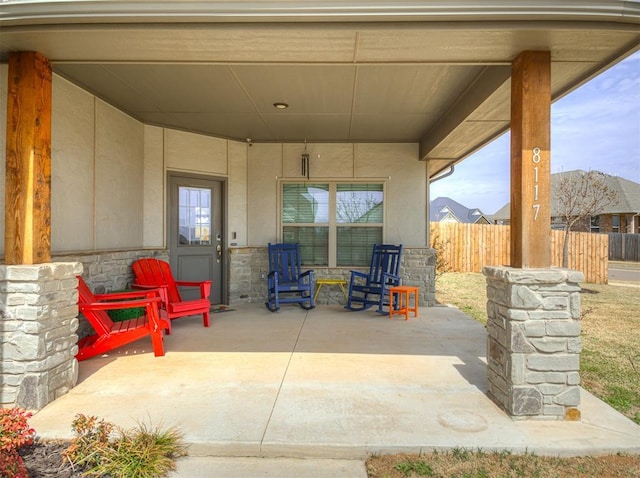 view of patio / terrace with fence