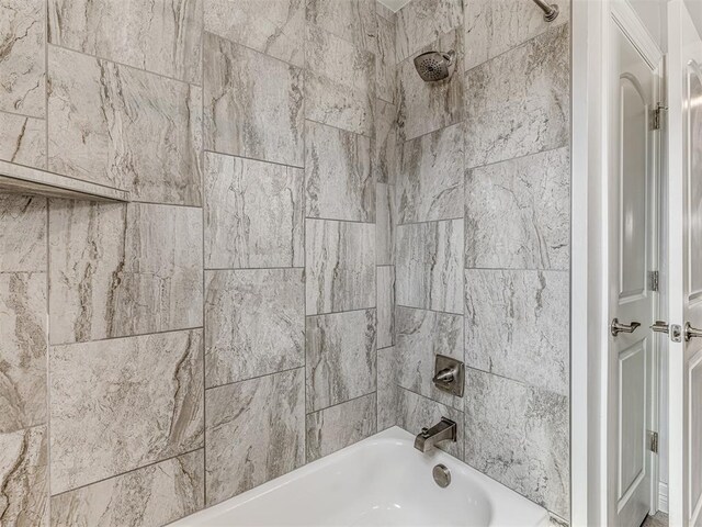 full bath featuring bathtub / shower combination