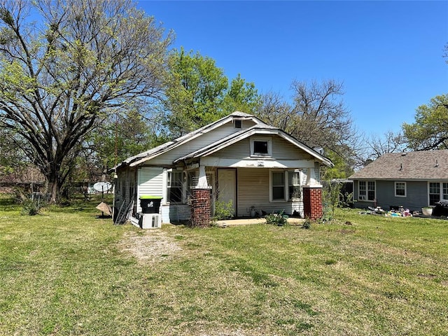 707 W Washington St, Tecumseh, OK 74873 - bungalow-style home with a front yard