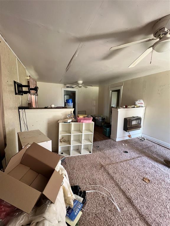 707 W Washington St, Tecumseh, OK 74873 - miscellaneous room featuring a ceiling fan