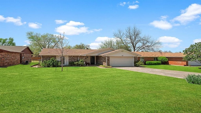 504 N 6th St, Noble, OK 73068 - single story home with driveway, a garage, and a front lawn