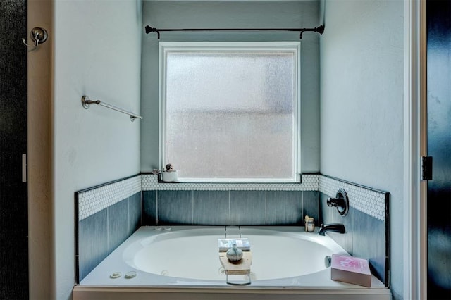 full bath with a bath