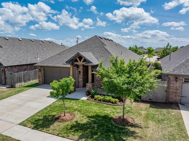 2420 NW 179th Ter, Edmond, OK 73012 - ranch-style home with brick siding, roof with shingles, and fence