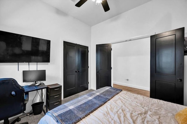 2420 NW 179th Ter, Edmond, OK 73012 - bedroom with baseboards, ceiling fan, wood finished floors, and lofted ceiling