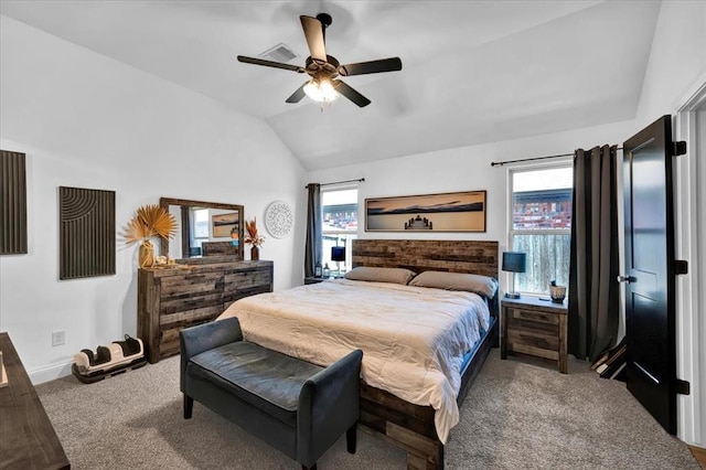 2420 NW 179th Ter, Edmond, OK 73012 - carpeted bedroom featuring baseboards, multiple windows, a ceiling fan, and vaulted ceiling