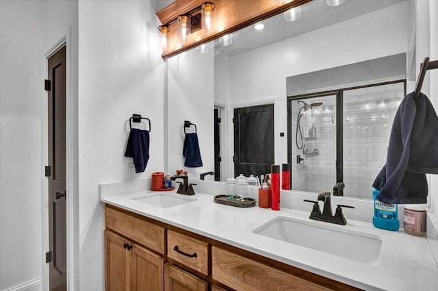 2420 NW 179th Ter, Edmond, OK 73012 - full bathroom featuring double vanity, a sink, and a stall shower
