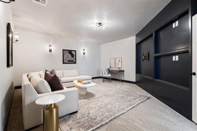 13120 Knight Island Dr, Oklahoma City, OK 73142 - living area featuring baseboards, visible vents, and carpet floors