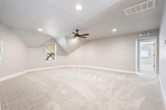 13120 Knight Island Dr, Oklahoma City, OK 73142 - additional living space with light carpet, a healthy amount of sunlight, ceiling fan, and visible vents