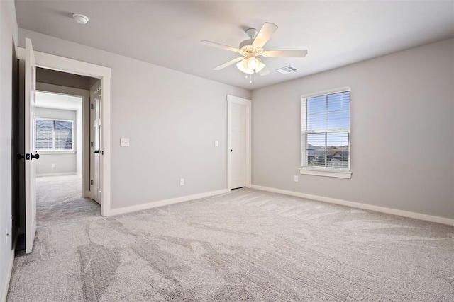 13120 Knight Island Dr, Oklahoma City, OK 73142 - carpeted empty room featuring visible vents, baseboards, and a ceiling fan
