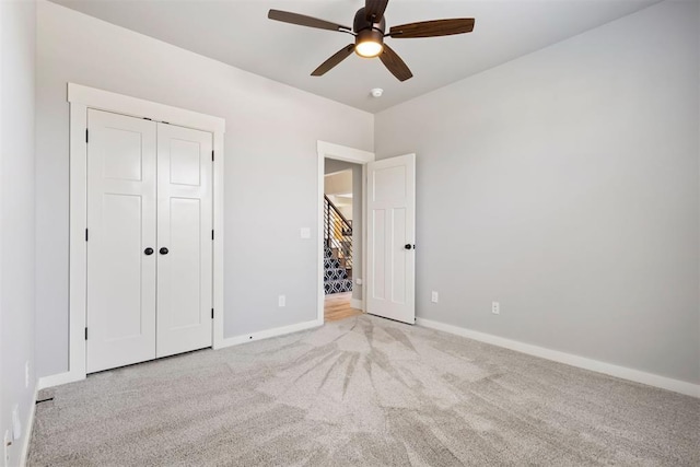 13120 Knight Island Dr, Oklahoma City, OK 73142 - unfurnished bedroom with a closet, baseboards, carpet flooring, and ceiling fan