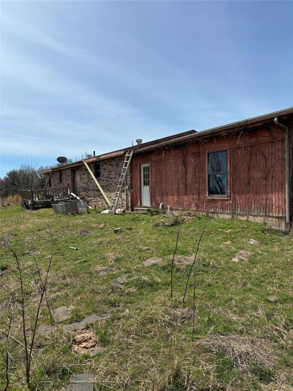 107068 N 3620th Rd, Paden, OK 74860 - rear view of property with a yard