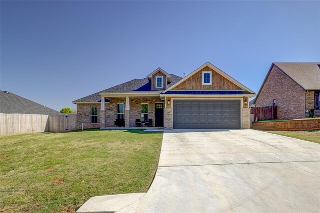 308 W Kerby Ave, Washington, OK 73080 - craftsman inspired home with a front yard, fence, a garage, and driveway