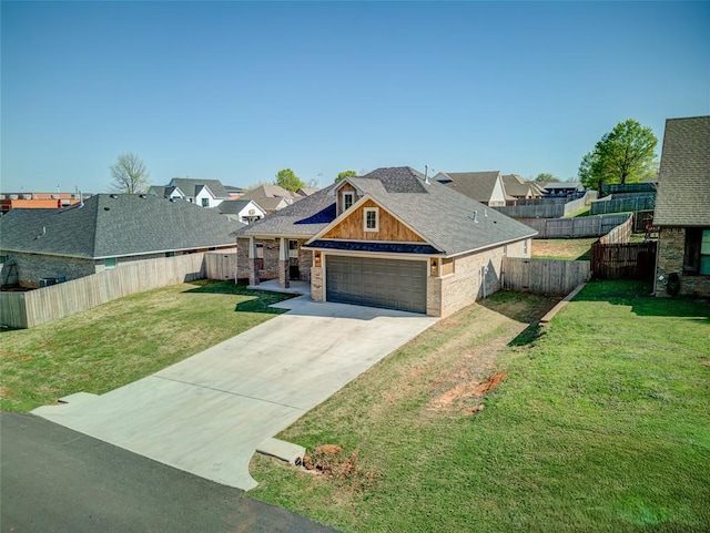 308 W Kerby Ave, Washington, OK 73080 - view of front facade featuring concrete driveway, a residential view, roof with shingles, a front yard, and a fenced backyard