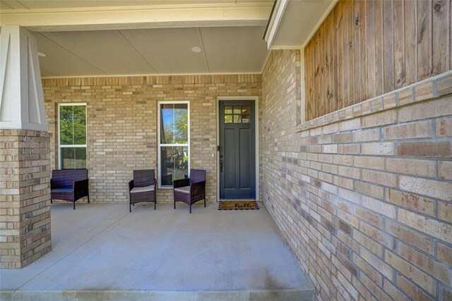 308 W Kerby Ave, Washington, OK 73080 - entrance to property featuring a porch and brick siding