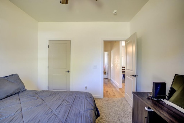 308 W Kerby Ave, Washington, OK 73080 - bedroom with baseboards and light colored carpet