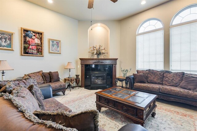 19605 Talavera Ln, Edmond, OK 73012 - living room featuring recessed lighting, tile patterned flooring, a tile fireplace, and ceiling fan