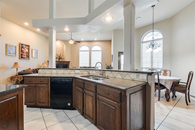 19605 Talavera Ln, Edmond, OK 73012 - kitchen with a wealth of natural light, visible vents, a sink, and black dishwasher