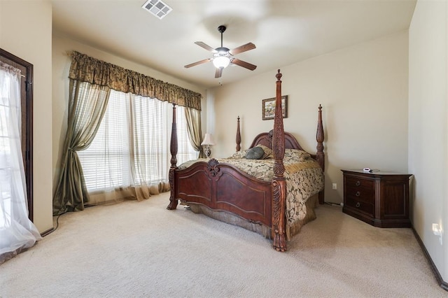 19605 Talavera Ln, Edmond, OK 73012 - carpeted bedroom featuring ceiling fan, baseboards, and visible vents