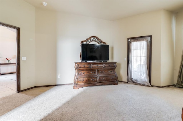 19605 Talavera Ln, Edmond, OK 73012 - bedroom featuring light colored carpet and baseboards