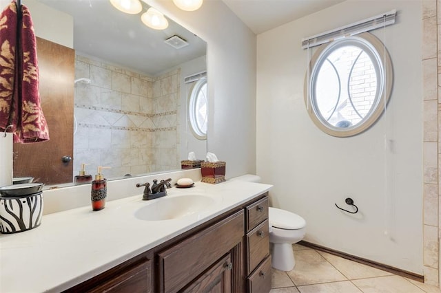 19605 Talavera Ln, Edmond, OK 73012 - full bath with vanity, baseboards, tile patterned floors, toilet, and visible vents