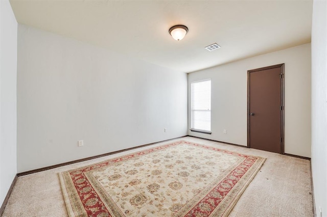 19605 Talavera Ln, Edmond, OK 73012 - unfurnished room featuring visible vents, baseboards, and carpet flooring