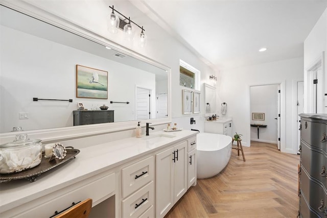 8416 NW 130th St, Oklahoma City, OK 73142 - full bathroom featuring recessed lighting, a soaking tub, and vanity