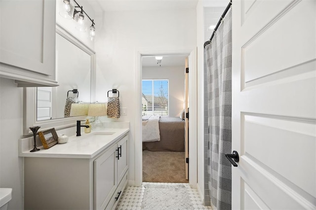 8416 NW 130th St, Oklahoma City, OK 73142 - bathroom featuring tile patterned floors, vanity, and ensuite bath