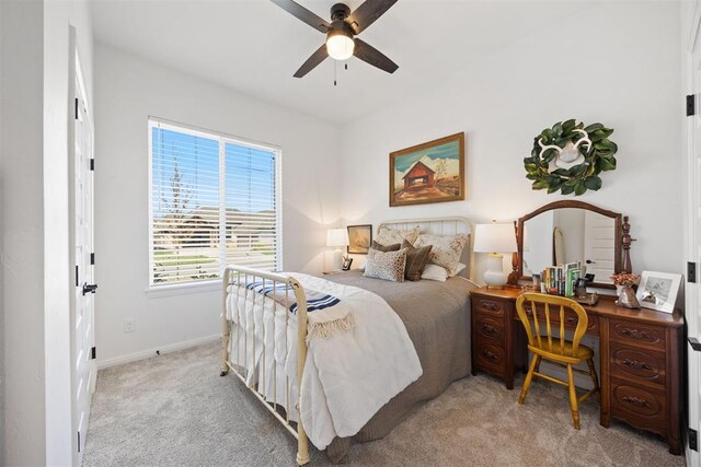 8416 NW 130th St, Oklahoma City, OK 73142 - bedroom featuring ceiling fan, baseboards, and carpet floors