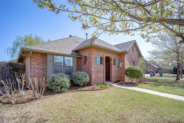 4621 NW 157th Ter, Edmond, OK 73013 - view of front of house with brick siding and roof with shingles