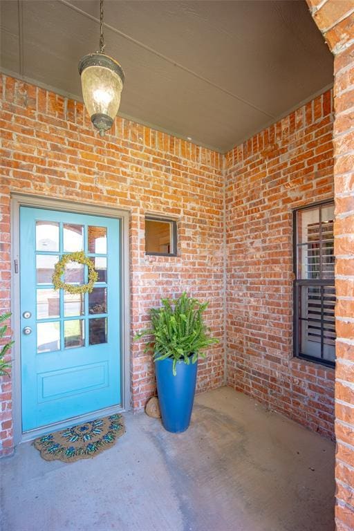 4621 NW 157th Ter, Edmond, OK 73013 - entrance to property featuring brick siding