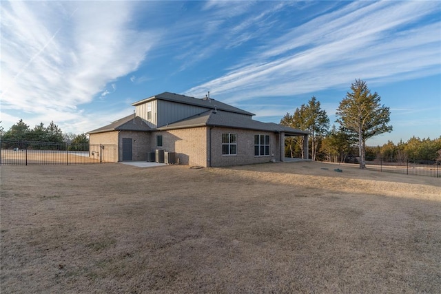 back of house featuring fence