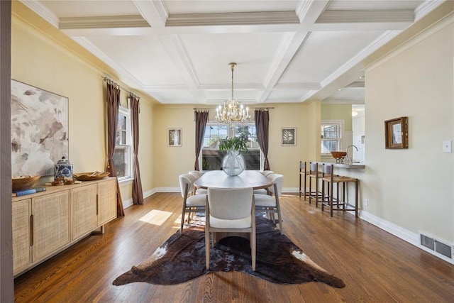 500 NW 41st St, Oklahoma City, OK 73118 - dining space with a notable chandelier, visible vents, coffered ceiling, and dark wood finished floors