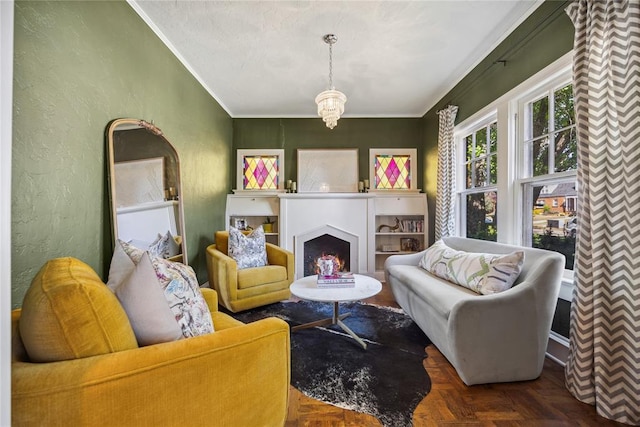 500 NW 41st St, Oklahoma City, OK 73118 - living room with ornamental molding, a notable chandelier, a textured wall, and a fireplace
