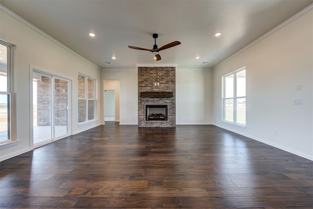 unfurnished living room with crown molding, baseboards, a ceiling fan, and dark wood-style floors