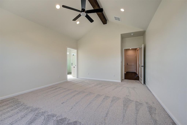 carpeted spare room featuring baseboards, a ceiling fan, visible vents, beamed ceiling, and high vaulted ceiling