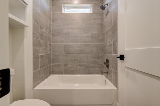 full bathroom with toilet and washtub / shower combination