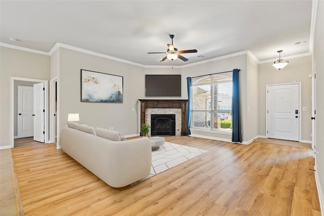 9233 SW 48th Ter, Oklahoma City, OK 73179 - living area with ceiling fan, light wood-style floors, and baseboards