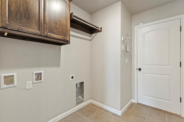 9233 SW 48th Ter, Oklahoma City, OK 73179 - laundry room featuring cabinet space, light tile patterned floors, electric dryer hookup, and hookup for a washing machine
