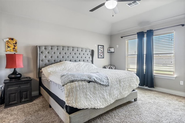 bedroom with visible vents, baseboards, a ceiling fan, carpet, and vaulted ceiling