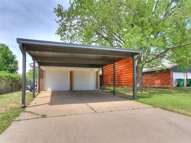 901 Richmond St, Yukon, OK 73099 - exterior space featuring a detached garage and fence