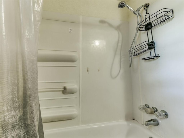 901 Richmond St, Yukon, OK 73099 - bathroom featuring shower / bathtub combination with curtain