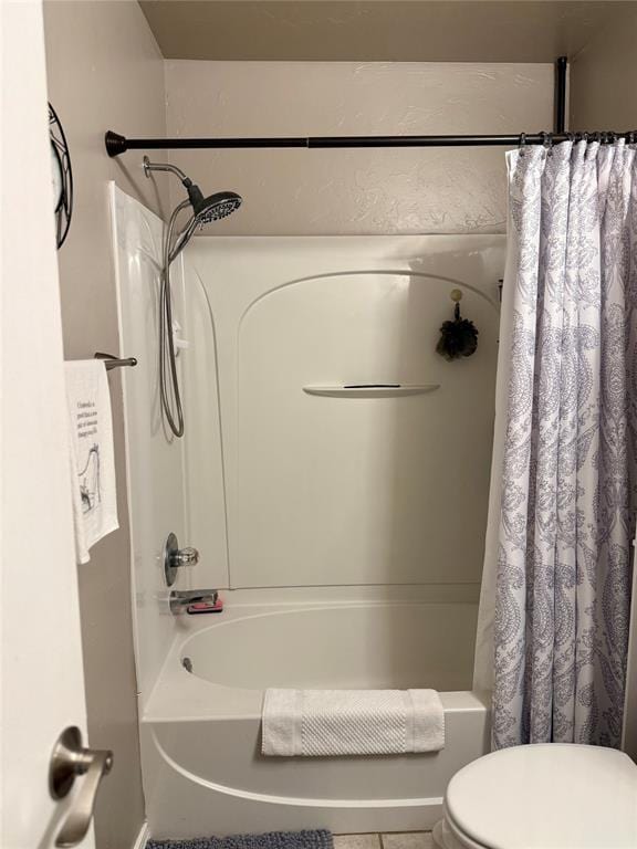 full bath featuring toilet and shower / bathtub combination with curtain