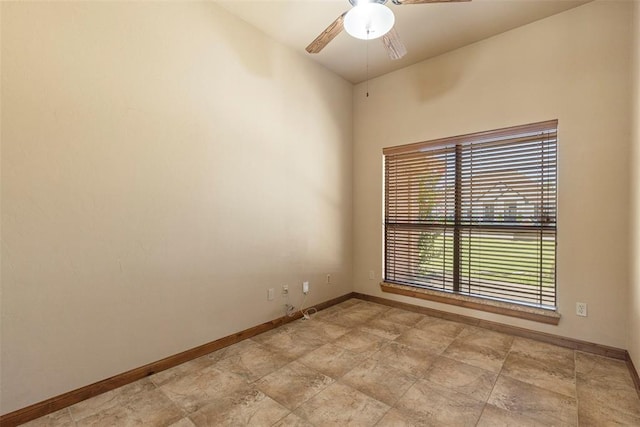18395 Wild Horse Trl, Norman, OK 73072 - unfurnished room with baseboards and ceiling fan