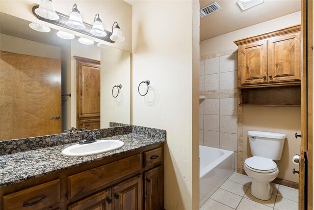 18395 Wild Horse Trl, Norman, OK 73072 - bathroom featuring tile patterned floors, vanity, visible vents, and toilet