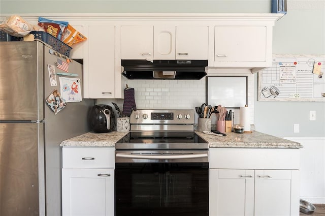 kitchen featuring backsplash, under cabinet range hood, white cabinetry, and stainless steel appliances