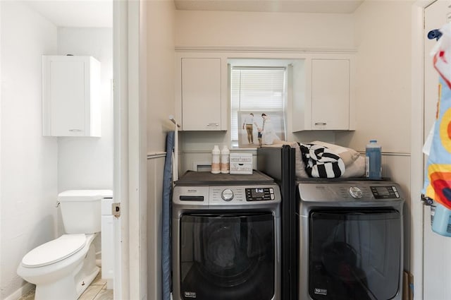 laundry room with washer and dryer and laundry area