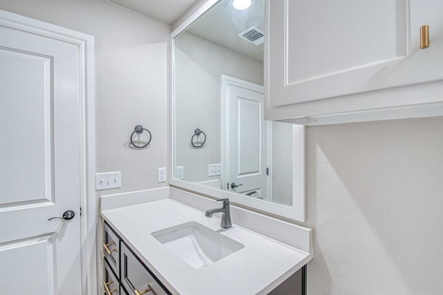 9328 NW 118th St, Yukon, OK 73099 - bathroom with visible vents and vanity