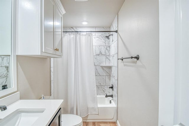 9328 NW 118th St, Yukon, OK 73099 - bathroom with toilet, wood finished floors, shower / bath combo with shower curtain, and vanity