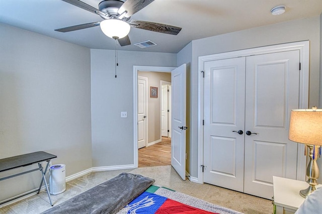 9328 NW 118th St, Yukon, OK 73099 - bedroom featuring a closet, visible vents, baseboards, and ceiling fan